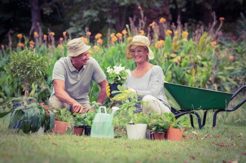 Gardener carrying out safe maintenance work in a managed outdoor setting